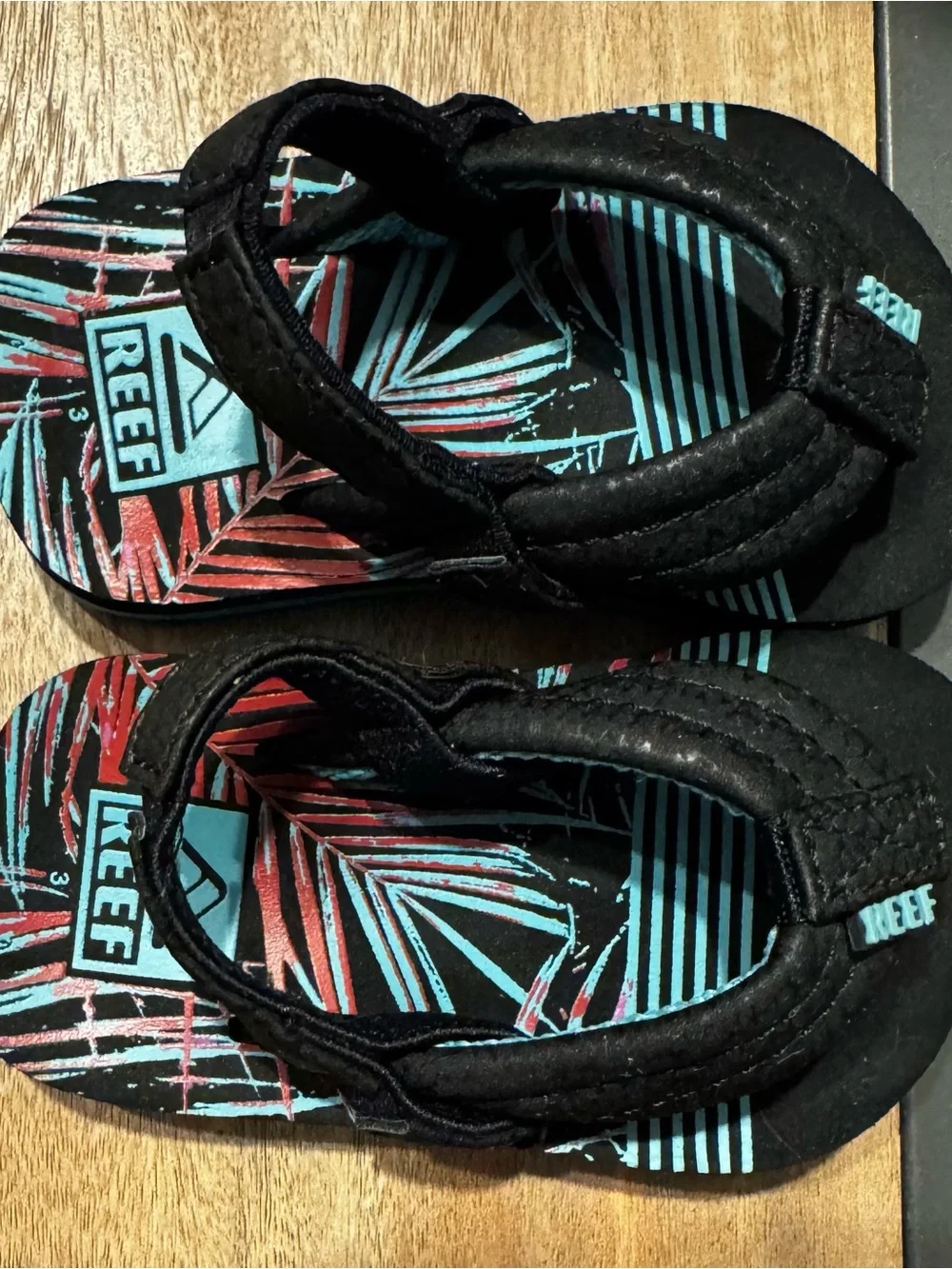 Reef baby/toddler Black Flip Flops with Teal & Coral Palm Print